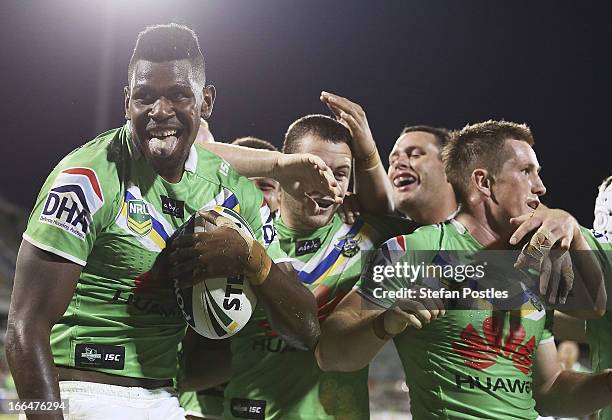 Raiders players celebrate a try by Edrick Lee during the round six NRL match between the Canberra Raiders and the New Zealand Warriors at Canberra...