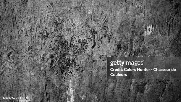 black and white photograph of a weathered and textured stone wall in london, england, united kingdom - cobblestone floor stock pictures, royalty-free photos & images