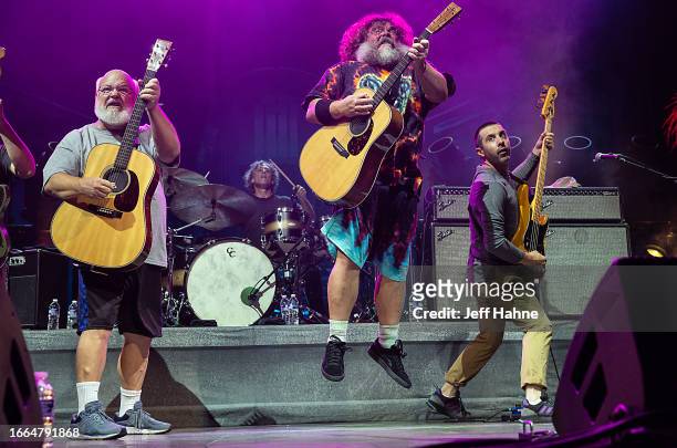 Kyle Gass, Jack Black and bassist John Spiker of Tenacious D perform at PNC Music Pavilion on September 06, 2023 in Charlotte, North Carolina.