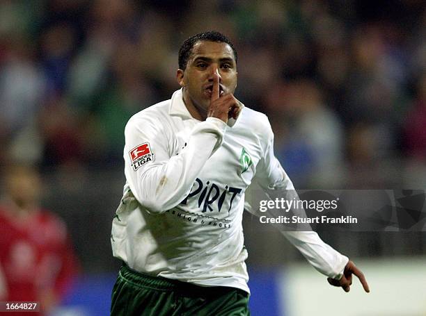 Ailton of Werder Bremen celebrates scoring the fourth goal during the Bundesliga match between SV Werder Bremen and 1 FC Kaiserslautern held on...