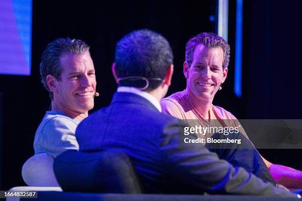 Cameron Winklevoss, co-founder and president of Gemini Trust Co., right, with his brother Tyler Winklevoss, co-founder and chief executive officer,...