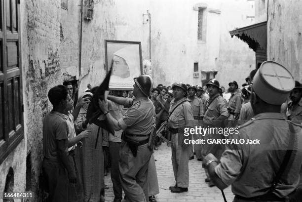 Tensions In Moroccoas The Celebration Of Aid El Kebir Approachs. Aout 1954 FEZ, foyer de l' insurrection, est coupée du monde. Protégés par une...