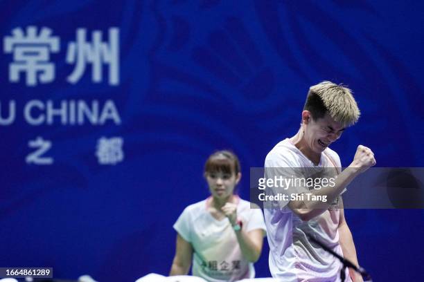 Ye Hong Wei and Lee Chia Hsin of Chinese Taipei celebrate the victory in the Mixed Doubles Second Round match against Feng Yanzhe and Huang Dongping...