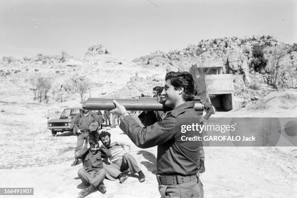 Lebanon War. Liban- 6 mars 1978- Guerre du Liban: Conflits intérieurs, attentats et milices; sur un site montagneux désertique, Bashir GEMAYEL issu...