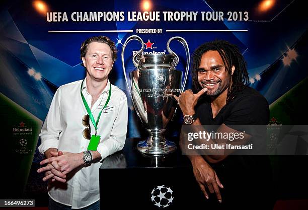 Ambassador Steve McManaman and Christian Karembeu poses with the UEFA Champions League trophy during the UEFA Champions League Trophy Tour 2013...