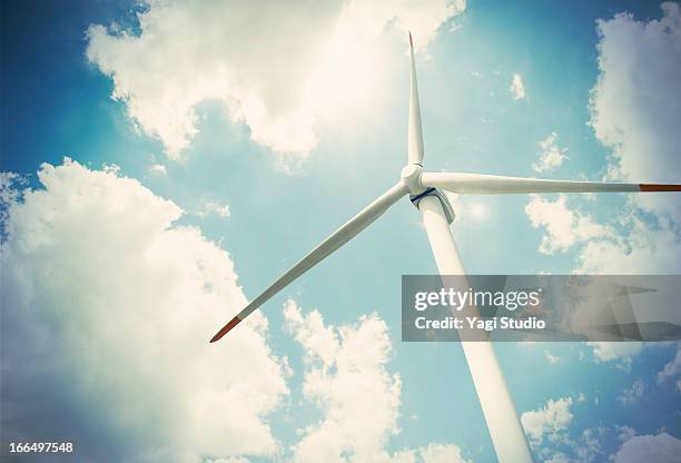 wind turbine and blue sky, view from below - wind power japan stock pictures, royalty-free photos & images