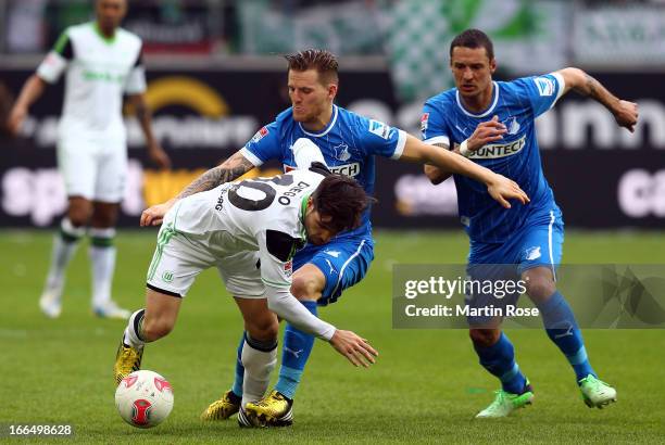 Diego of Wolfsburg and Euigen Polanski of Hoffenheim battles for the ball during the Bundesliga match between VfL Wolfsburg and TSG 1899 Hoffenheim...