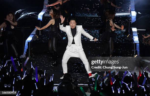 Singer PSY performs onstage in his concert titled "Happening" at Olympic Stadium on April 13, 2013 in Seoul, South Korea.