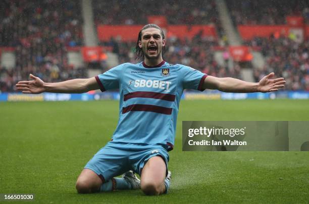 Andy Carroll of West Ham celebrates scoring a goal during the Barclays Premier League match between Southampton and West Ham United at St Mary's...