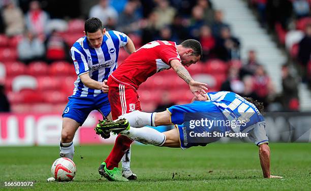 Middlesbrough forward Scott McDonald is crowded out by Brighton players Andrew Crofts and Andrea Orlandi during the npower Championship match between...