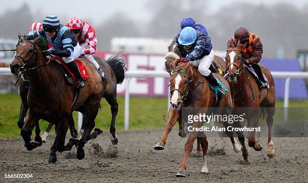 Eddie Ahern riding Desert Recluse win The Betfred 'The Bonus King' Queens Prize at Kempton Park racecourse on April 13, 2013 in Sunbury, England.