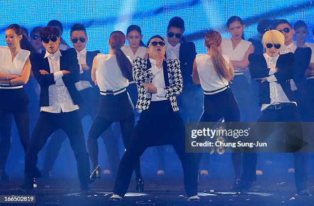 Singer PSY performs his new single 'Gentleman' in concert titled "Happening" at Olympic Stadium on April 13, 2013 in Seoul, South Korea.