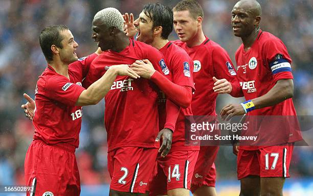 Shaun Maloney of Wigan Athletic celebrates scoring the opening goal with Arouna Kone and team mates during the FA Cup with Budweiser Semi Final match...