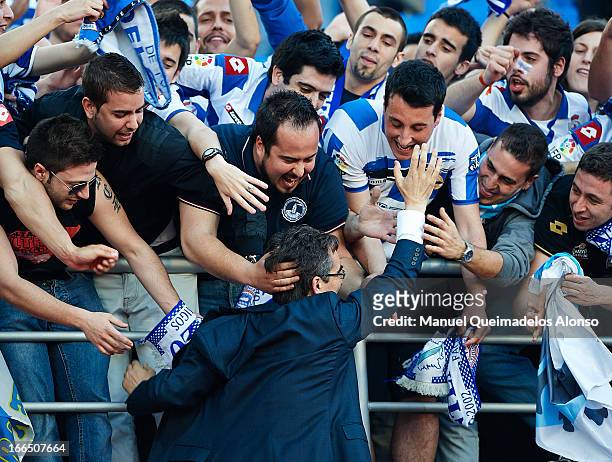 Coach Fernando Vazquez of RC Deportivo de La Coruna celebrates their victory with fans after the la la Liga match between Levante UD and RC Deportivo...