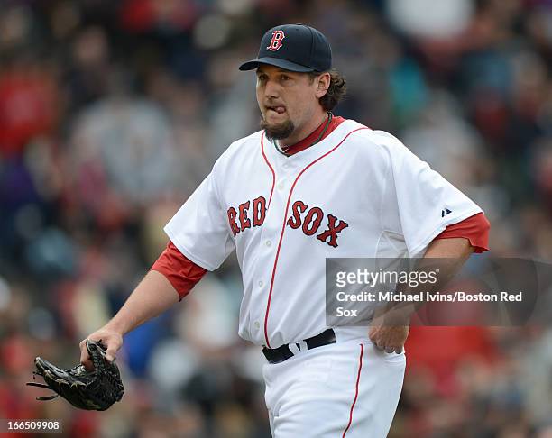 Joel Hanrahan of the Boston Red Sox walks off the mound after being pulled from the game against the Tampa Bay Rays in the ninth inning on April 13,...