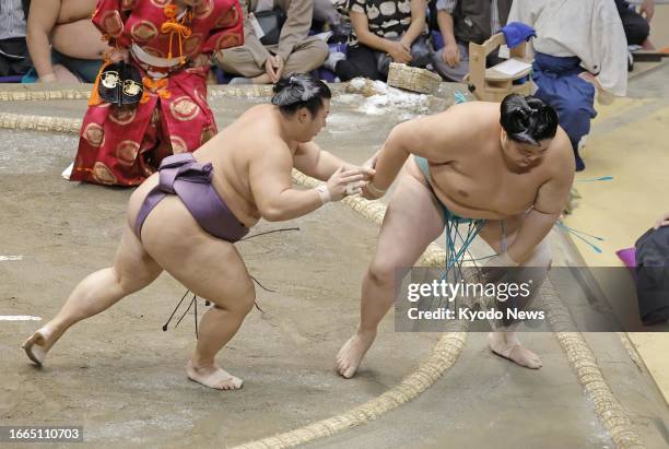 Komusubi Tobizaru beats sekiwake Kotonowaka on the fifth day of the 15-day Autumn Grand Sumo Tournament at Ryogoku Kokugikan in Tokyo on Sept. 14,...