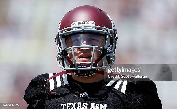 Texas A&M Aggies quarterback Johnny Manziel waits on the field before the Maroon & White spring football game at Kyle Field on April 13, 2013 in...