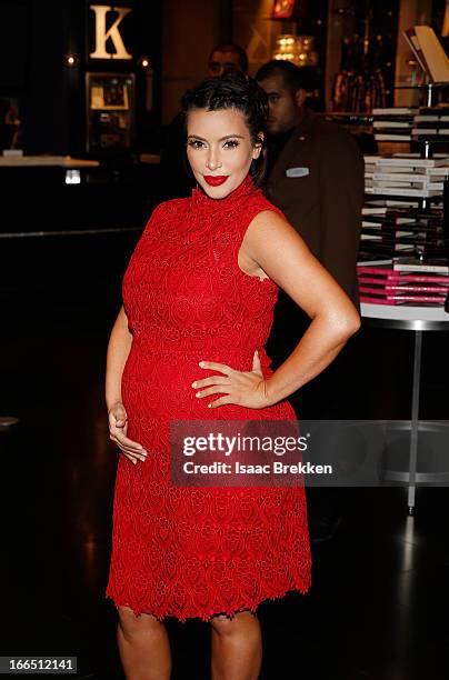 Television personality Kim Kardashian arrives at the Kardashian Khaos store at The Mirage Hotel & Casino for a fan meet-and-greet to support her...