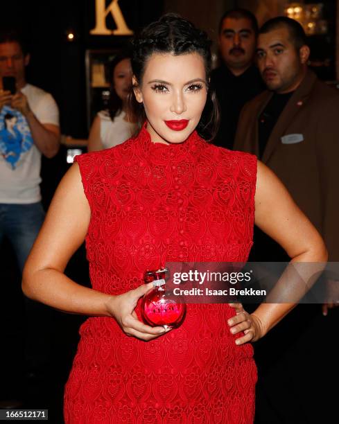 Television personality Kim Kardashian arrives at the Kardashian Khaos store at The Mirage Hotel & Casino for a fan meet-and-greet to support her...