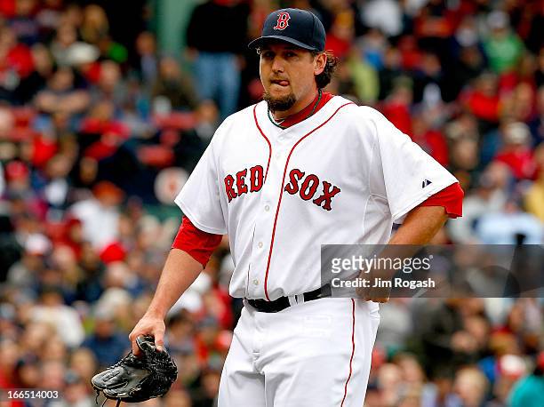 Joel Hanrahan of the Boston Red Sox is relieved in the ninth inning after walking two Tampa Bay Rays batters at Fenway Park on April 13, 2013 in...