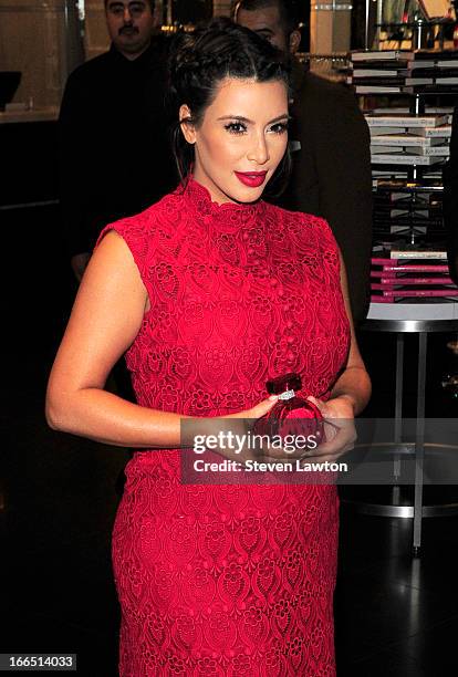 Television personality Kim Kardashian arrives at the Kardashian Khaos store at The Mirage Hotel & Casino for a fan meet-and-greet to support her...