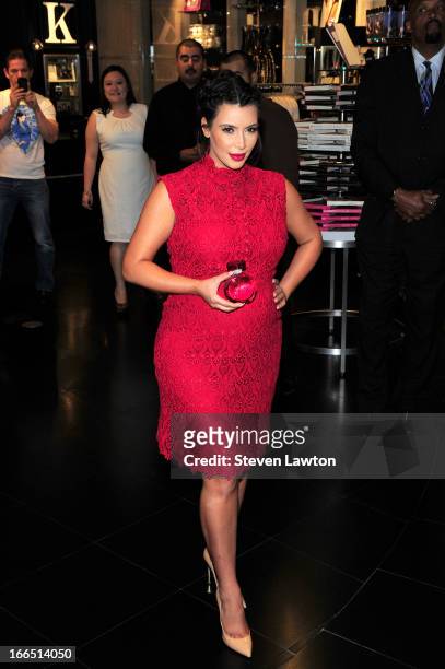 Television personality Kim Kardashian arrives at the Kardashian Khaos store at The Mirage Hotel & Casino for a fan meet-and-greet to support her...