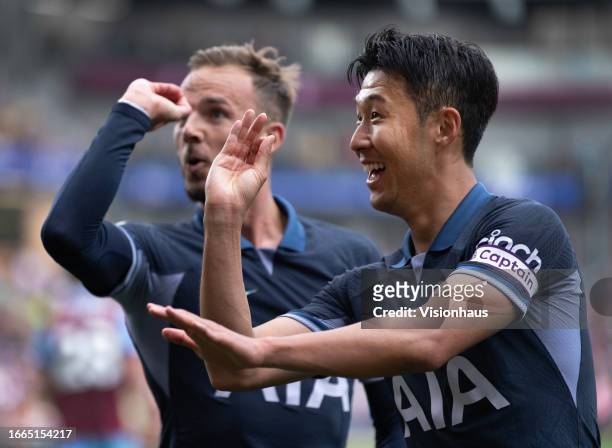 Heung-Min Son of Tottenham Hotspur celebrates with goalscorer James Maddison during the Premier League match between Burnley FC and Tottenham Hotspur...