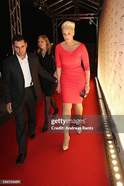 Brigitte Nielsen and her husband Mattia Dessi leave the Jaguar F-Type short film 'The Key' Premiere at e-Werk on April 13, 2013 in Berlin, Germany.