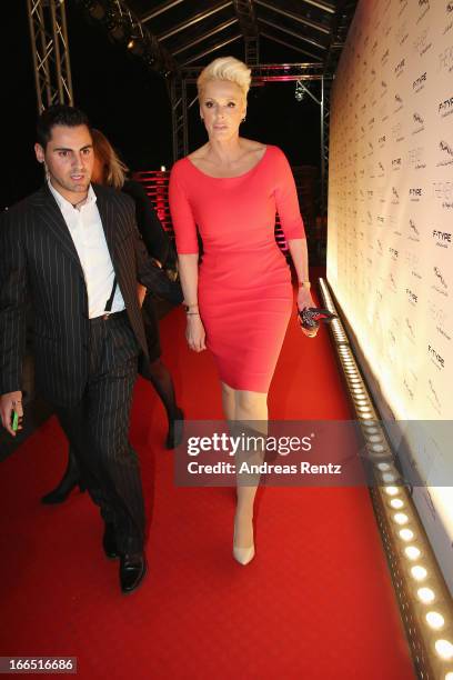 Brigitte Nielsen and her husband Mattia Dessi leave the Jaguar F-Type short film 'The Key' Premiere at e-Werk on April 13, 2013 in Berlin, Germany.