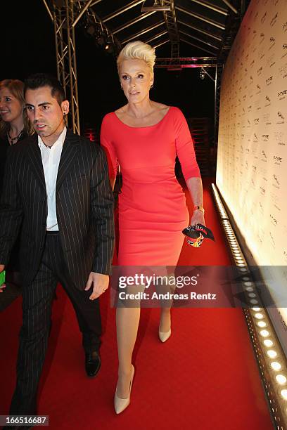 Brigitte Nielsen and her husband Mattia Dessi leave the Jaguar F-Type short film 'The Key' Premiere at e-Werk on April 13, 2013 in Berlin, Germany.