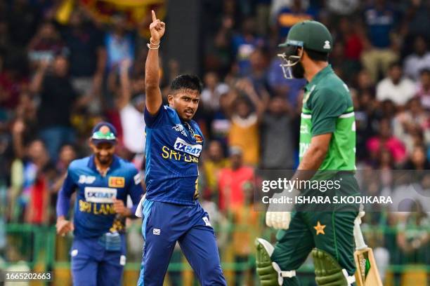 Sri Lanka's Pramod Madushan celebrates after taking the wicket of Pakistan's Fakhar Zaman during the Asia Cup 2023 Super Four one-day international...