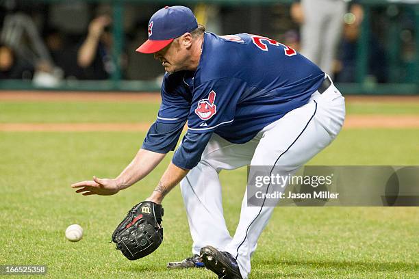 Relief pitcher Brett Myers of the Cleveland Indians fields a ground ball during the eighth inning against the New York Yankees at Progressive Field...