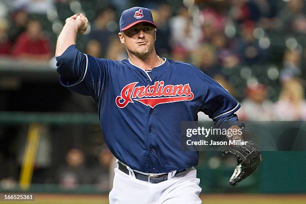 Relief pitcher Brett Myers of the Cleveland Indians throws to first during the eighth inning against the New York Yankees at Progressive Field on...