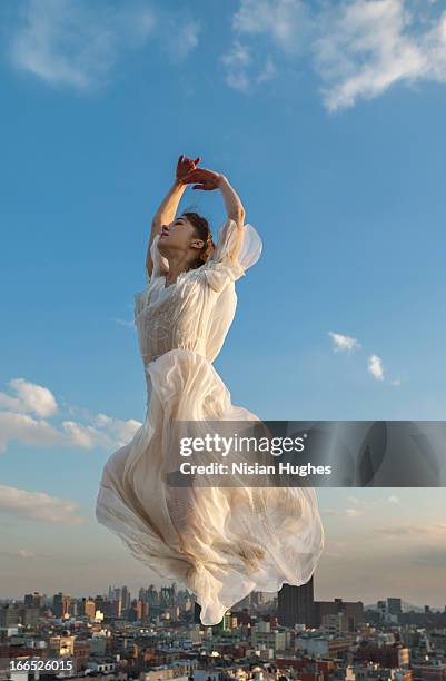 ballerina performing italian changement city below - long dress fotografías e imágenes de stock