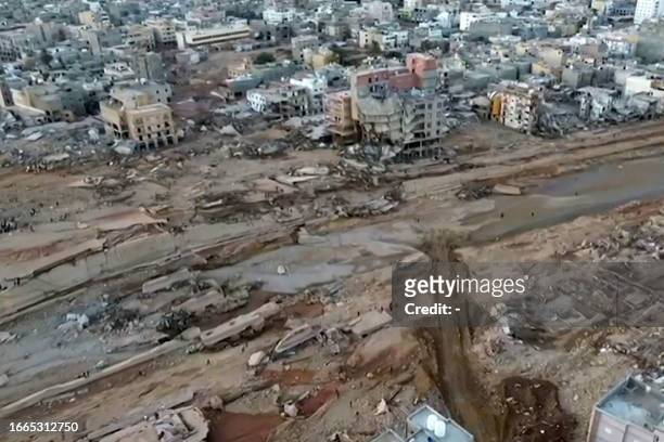 This image grab from an AFPTV footage taken on September 13 shows an aerial view of the damage caused by floods after the Mediterranean storm...