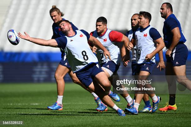 Gregory Alldritt of France stretches for the ball during the France Captain's Run ahead of their Rugby World Cup France 2023 match against New...