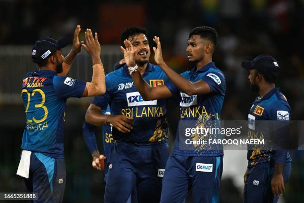 Sri Lanka's Matheesha Pathirana celebrates with teammates after taking the wicket of Pakistan's Abdullah Shafique during the Asia Cup 2023 Super Four...