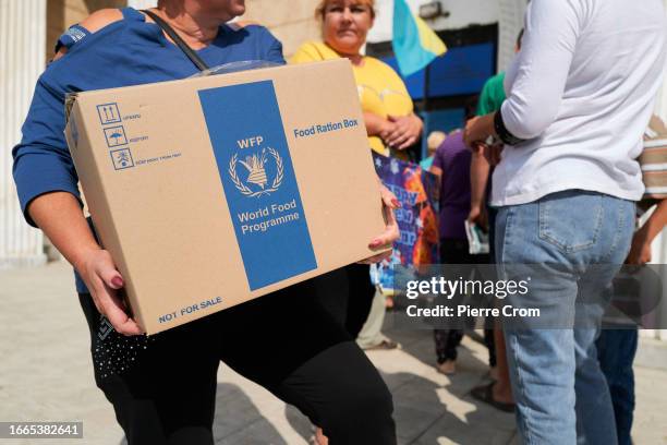Residents of villages in the Zaporizhzhia region receive humanitarian aid from the international World Food Programme on September 14, 2023 in...