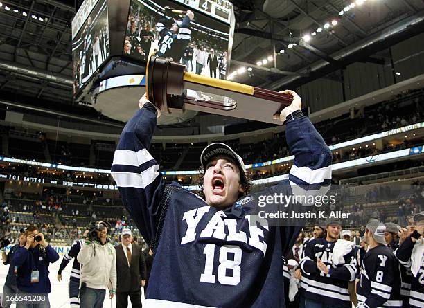 Kenny Agostino of the Yale Bulldogs celebrates after defeating the Quinnipiac Bobcats in the Men's Ice Hockey National Championship game at Consol...