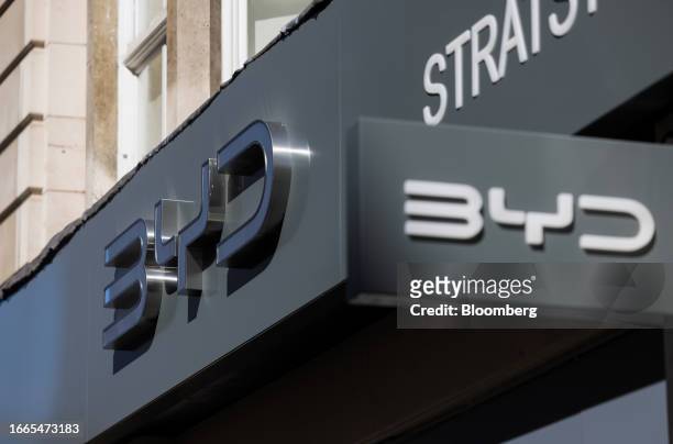 Sign above a soon-to-open BYD Co. Automobile showroom in the Mayfair district of London, UK, on Thursday, Sept. 14, 2023. China's EV industry has...