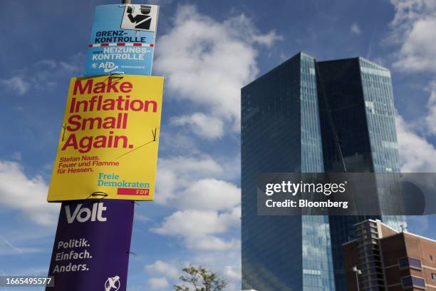 Election campaign posters, including one which reads "Make Inflation Small Again" near the European Central Bank in Frankfurt, Germany, on Thursday,...