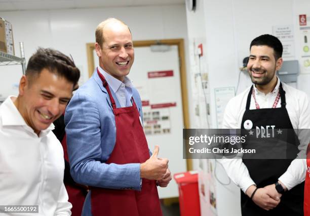 Prince William, Prince of Wales speaks to Pret staff with CEO Pano Christou during a visit to Pret A Manger on September 07, 2023 in Bournemouth,...