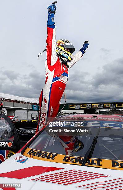 An emotional Jason Bright of Team BOC celebrates winning the Jason Richards Memorial Trophy after Race 9 of the ITM 400 V8 Supercars race on April...