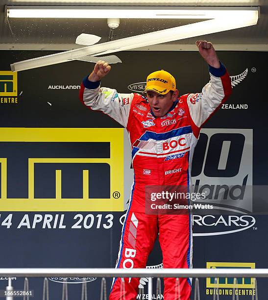 Jason Bright of Team BOC reacts as he breaks a light jumping for joy after winning the Jason Richards Memorial Trophy after Race 9 of the ITM 400 V8...