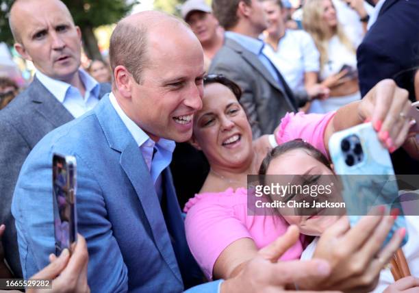 Prince William, Prince of Wales poses for selfies with members of the public as he visits Pret A Manger on September 07, 2023 in Bournemouth,...