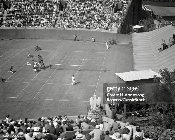 1940s Spectators watching tennis match forest hills stadium in the borough of queens new york city USA.