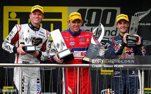 Jason Bright of Team BOC poses for a photo with Garth Tander and Jamie Whincup after winning the Jason Richards Memorial Trophy during the ITM 400 V8...