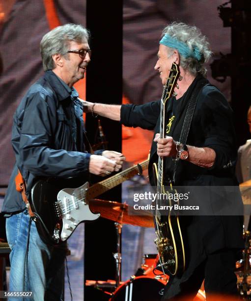 Eric Clapton and Keith Richards perform on stage during the 2013 Crossroads Guitar Festival at Madison Square Garden on April 13, 2013 in New York...