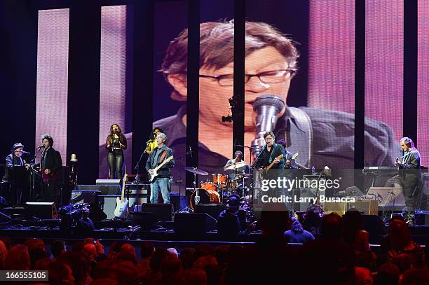 Eric Clapton and Robbie Robertson performs on stage during the 2013 Crossroads Guitar Festival at Madison Square Garden on April 13, 2013 in New York...