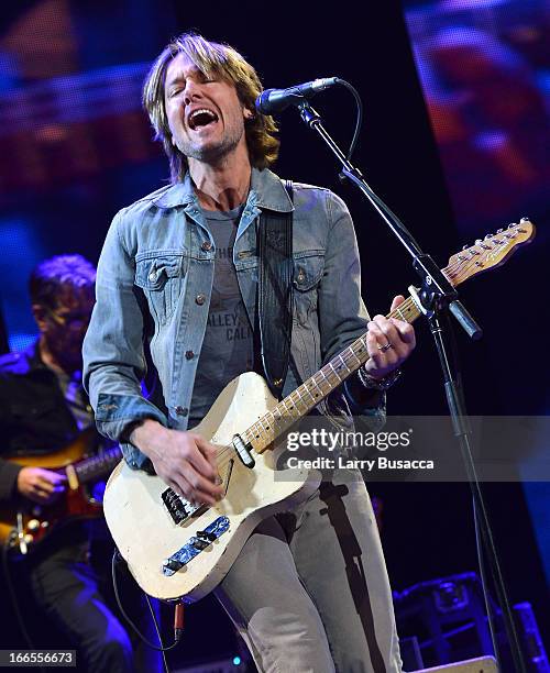 Keith Urban performs on stage during the 2013 Crossroads Guitar Festival at Madison Square Garden on April 13, 2013 in New York City.